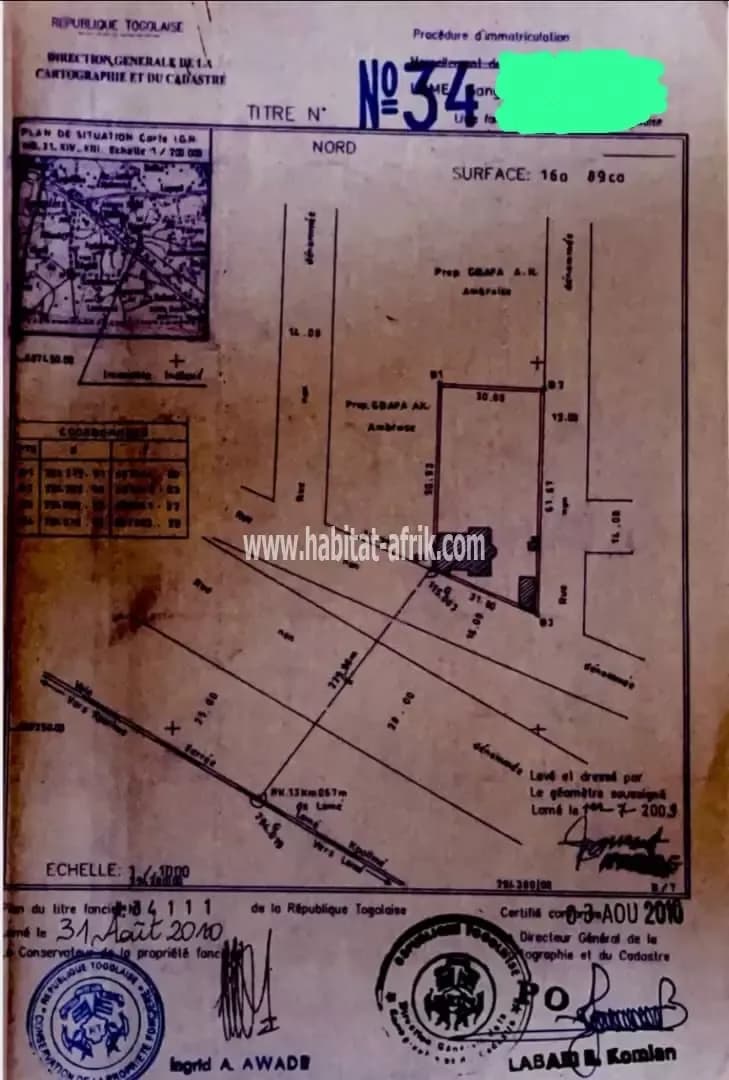 Nous mettons en vente une parcelle de terrain 02 lots 3/4 a adidogome kohe rails lome togo