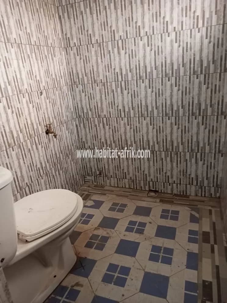 LOCATION APPARTEMENT CHAMBRE SALON WC DOUCHE CUISINE A ADIDOADIN LOME-TOGO